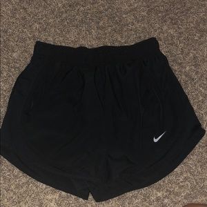 All black Dri-Fit tempo running Nike shorts